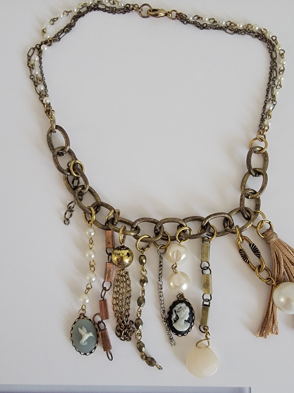 Anthropologie Antique Gold and Cream Multi-Charm Pendant Necklace